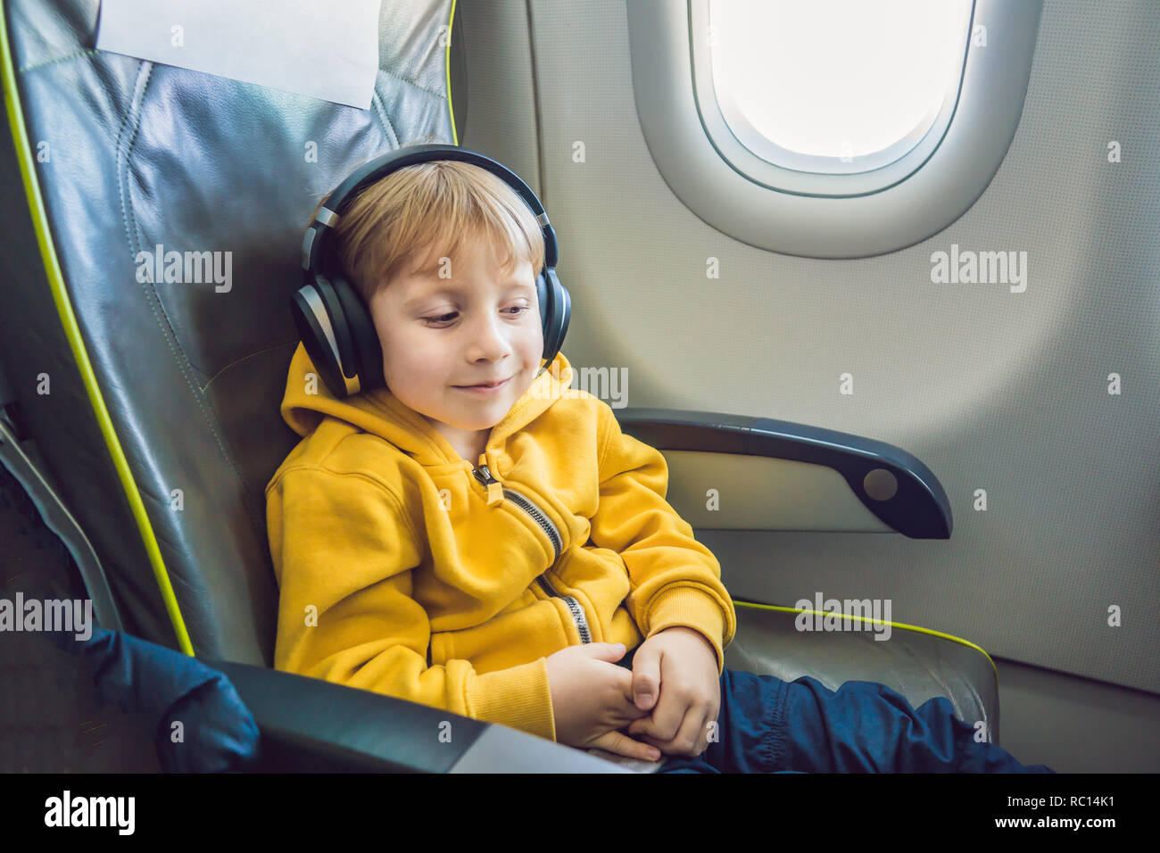Airline passenger headphones hires stock photography and images Alamy