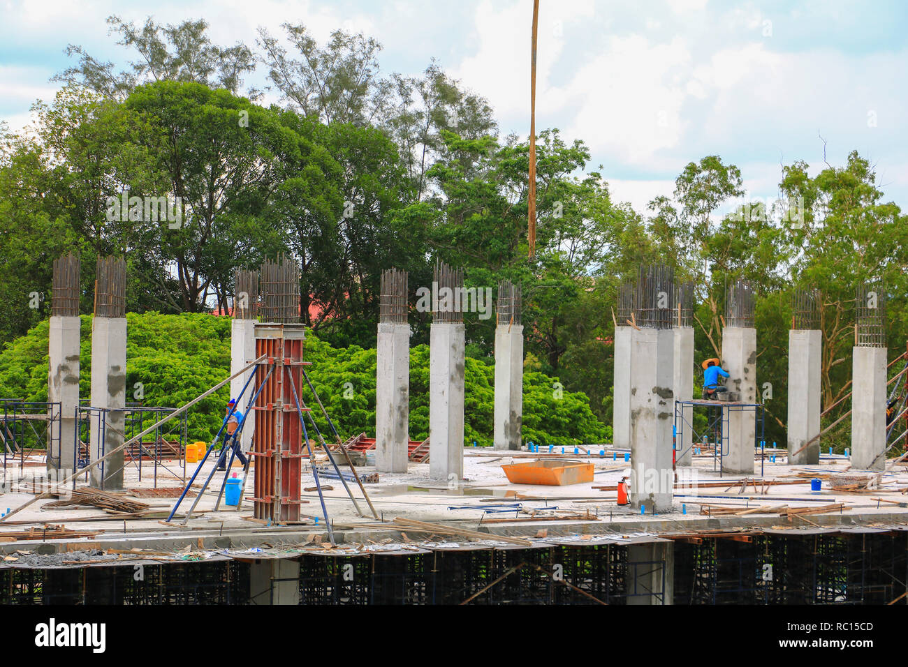 construction laborer team working on high ground building commercial in ...