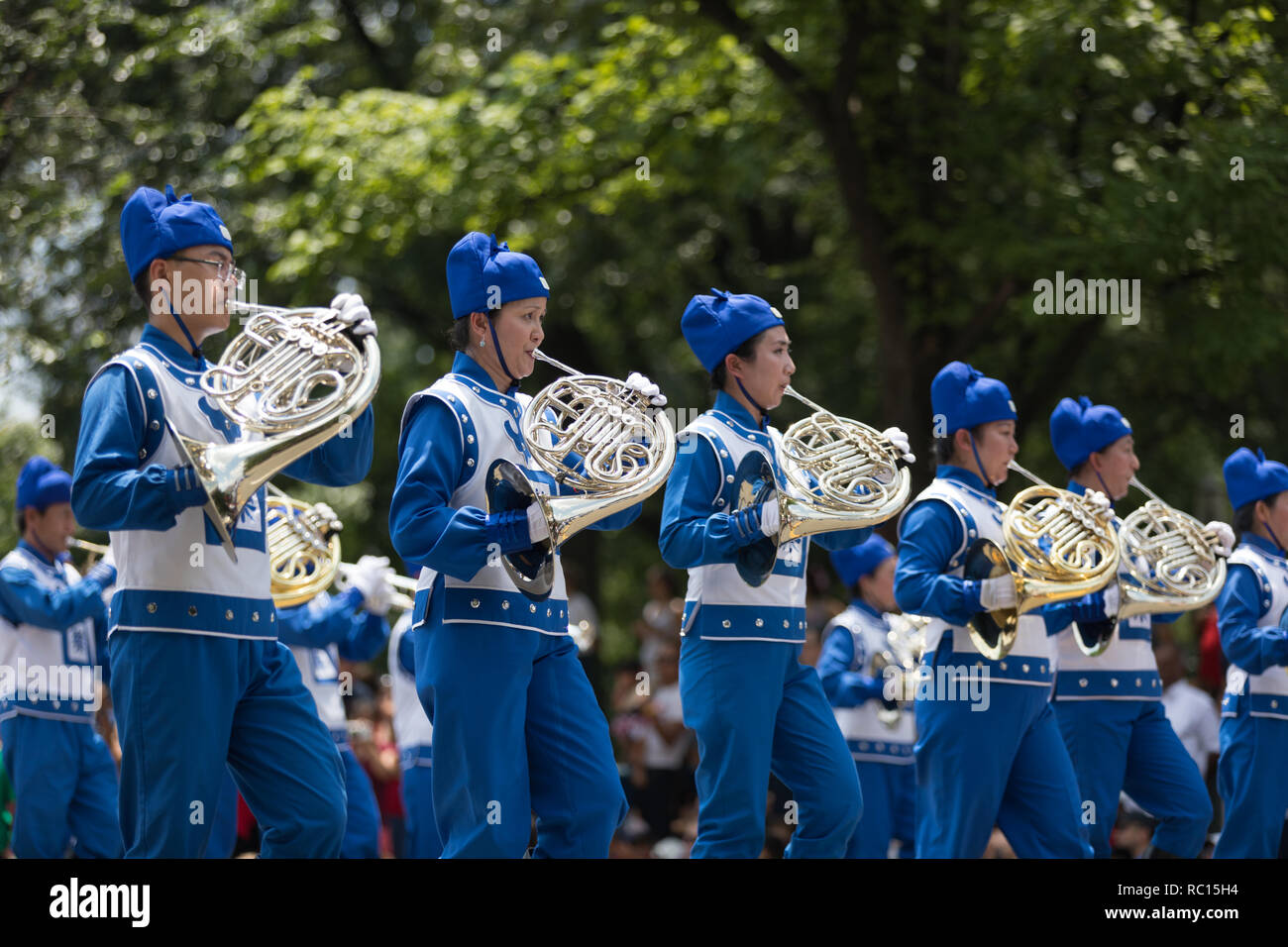 Washington, D.C., USA - July 4, 2018, The National Independence Day Parade, Falun Dafa chinese marching band, wearing traditional clothing, marching d Stock Photo