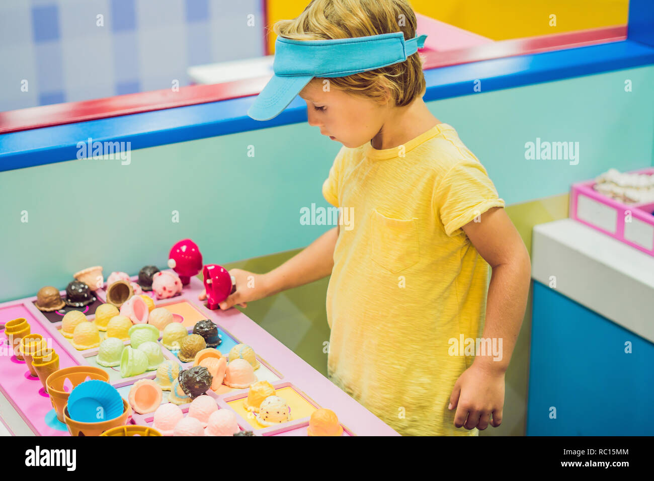 Children play as ice cream seller. Stock Photo