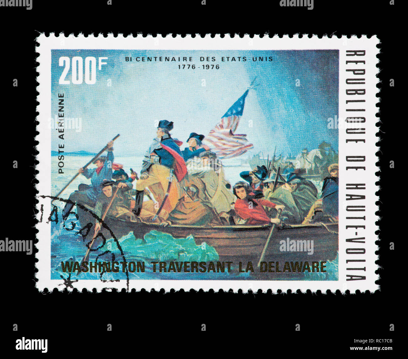 Postage stamp from Upper Volta (Burkina Faso) depicting Washington crossing the Delaware river, United States bicentennial. Stock Photo