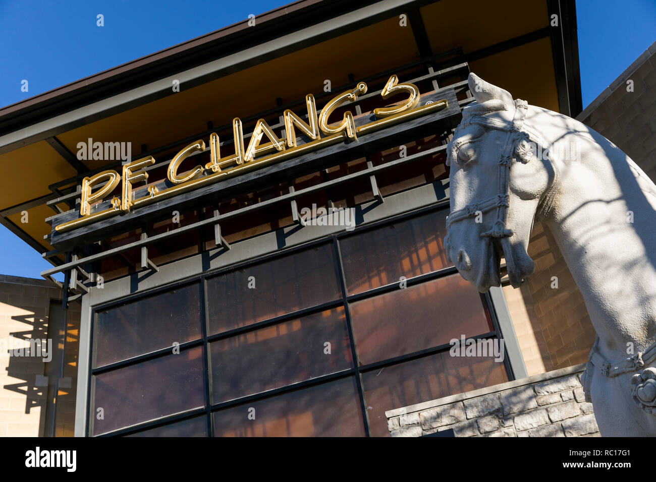 A logo sign outside of a P. F. Chang's China Bistro restaurant in