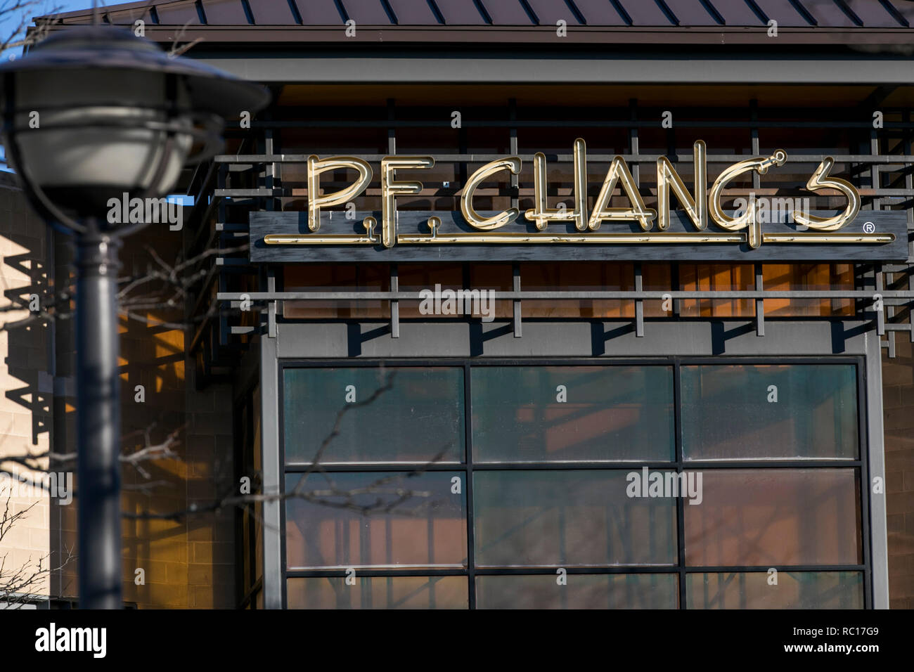 A logo sign outside of a P. F. Chang's China Bistro restaurant in