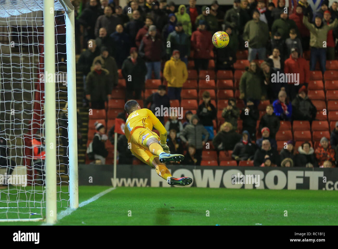 Barnsley, UK. 12th Jan, 2019. 12th January 2019, Oakwell, Barnsley, England; Sky Bet League One, Barnsley vs Bradford City ; Richard O'Donnell (01) of Bradford City makes a full stretch save from Alex Mowatt (27) of Barnsley's free-kick Credit: Mark Cosgrove/News Images English Football League images are subject to DataCo Licence Credit: News Images /Alamy Live News Stock Photo