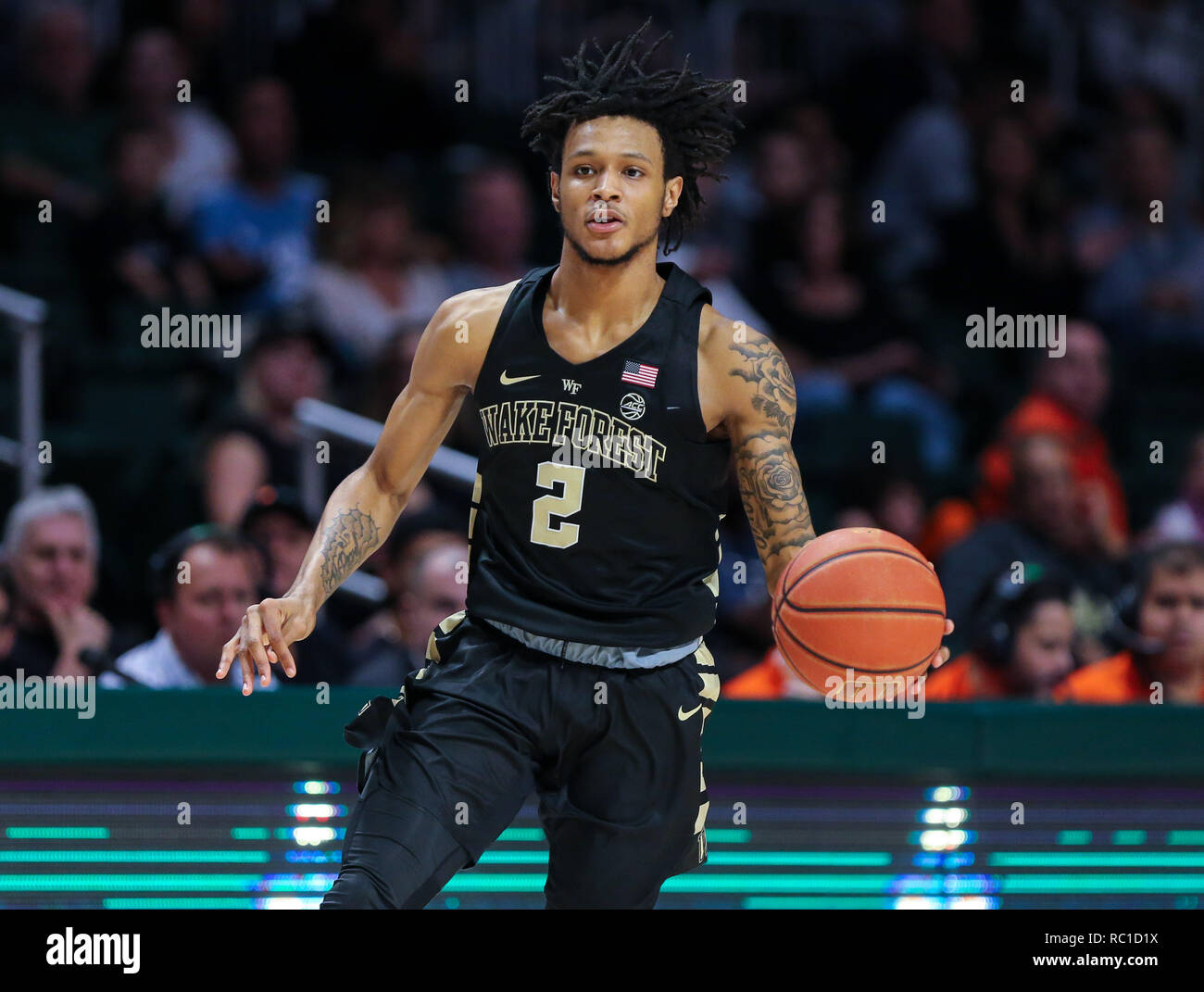 Coral Gables, Florida, USA. 12th Jan, 2019. Wake Forest Demon Deacons guard Sharone Wright Jr. (2) moves the ball during an NCAA men's basketball game agains against the Miami Hurricanes at the Watsco Center in Coral Gables, Florida. Miami won 76-65. Mario Houben/CSM/Alamy Live News Stock Photo