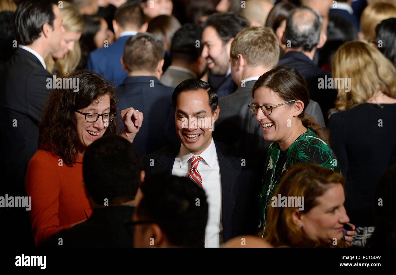 Washington, DC. 12th Oct, 2016. United States Department of Housing and Urban Development Secretary Julian Castro (C) attends a reception for Hispanic Heritage Month in the East Room of the White House on October 12, 2016 in Washington, DC. Credit: Olivier Douliery/Pool via CNP | usage worldwide Credit: dpa/Alamy Live News Stock Photo