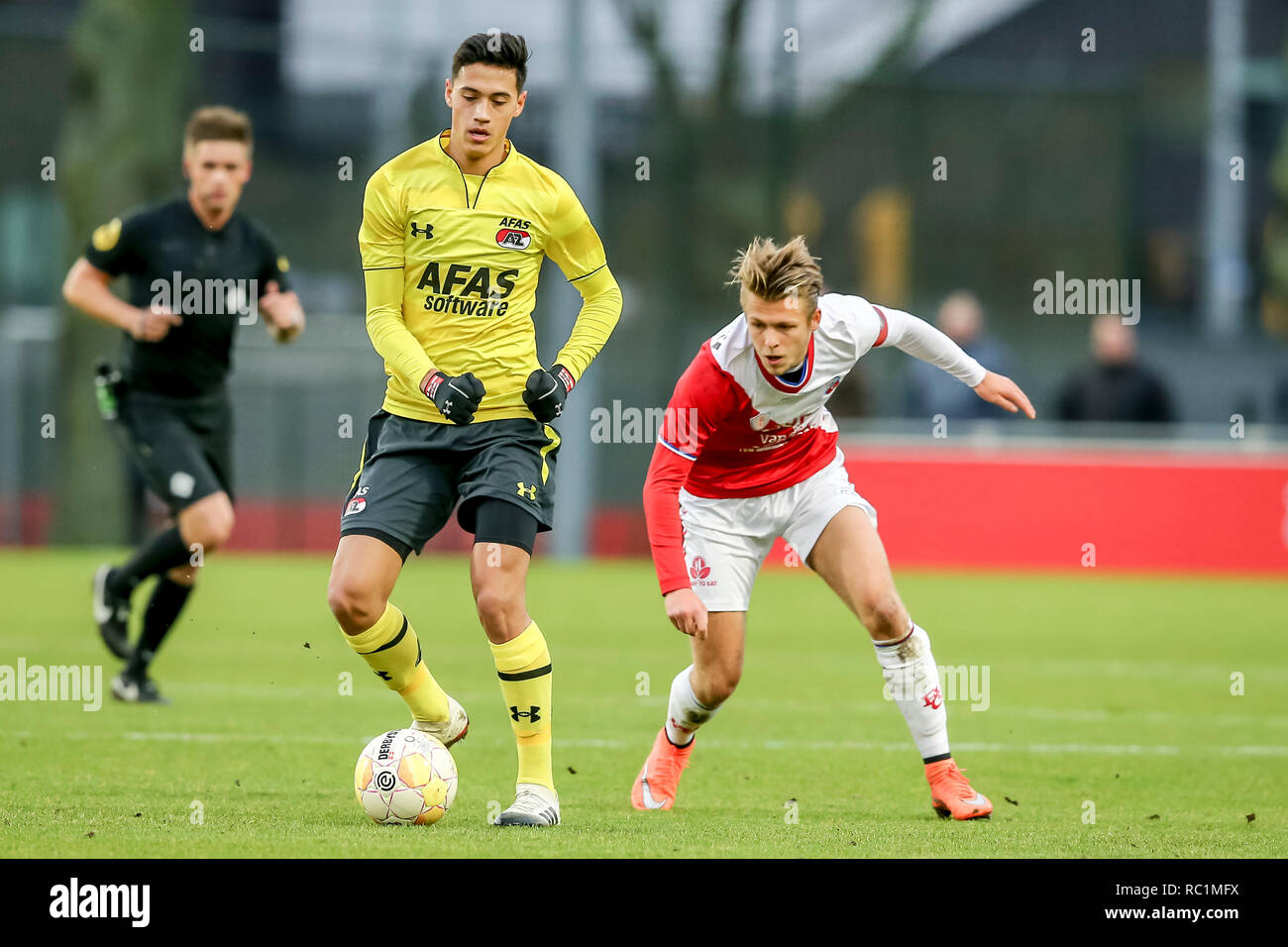 UTRECHT, 13-01-2019 , Keuken Kampioen Divisie, Jong Utrecht - Jong AZ ,season 2018 / 2019, Jong AZ player Tijjano Reijnders (l) Jong FC Utrecht player Tim Brinkman (r) during the match Jong Utrecht - Jong AZ Stock Photo