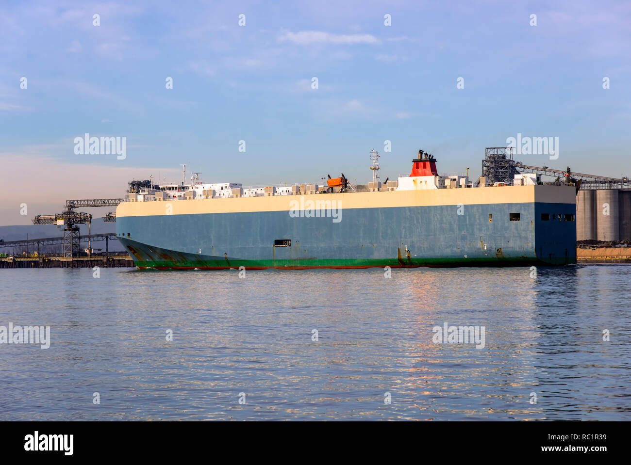 Large cargo tanker crusing back to the Pacific ocean Oregon. Stock Photo