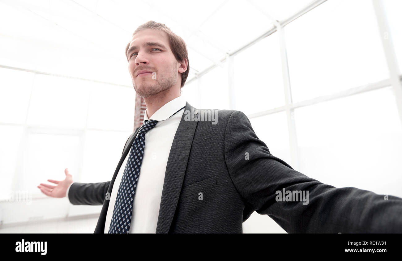 Happy businessman raises hands Stock Photo - Alamy