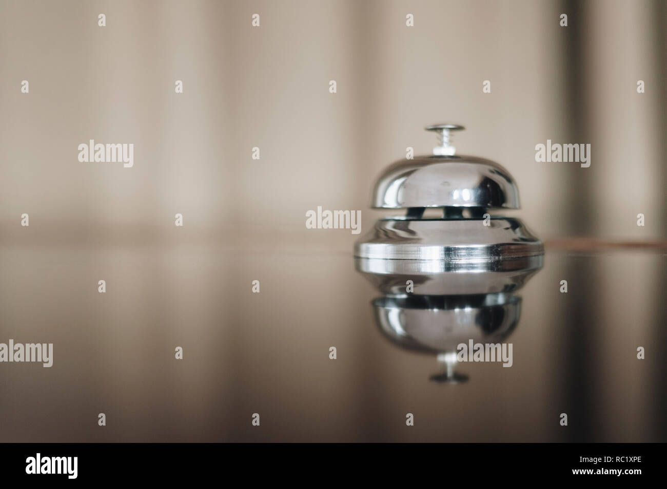 service bell on the hotel reception desk with copy space Stock Photo Alamy
