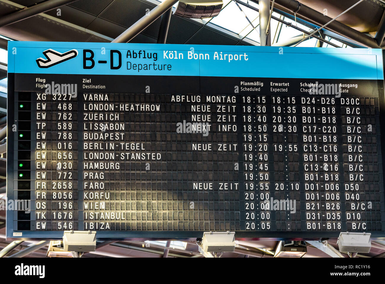 Flight departures timetable in Cologne/Bonn airport showing international and national flights, Germany. Stock Photo