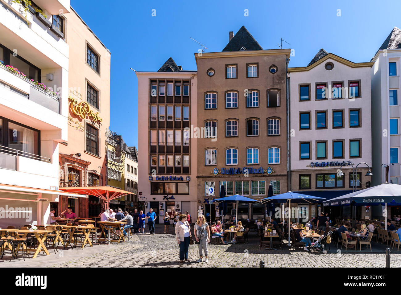 Cologne, Germany. View of Heumarkt square, popular turistic spot with  traditional German colourful buildings, restaurants and shops Stock Photo -  Alamy