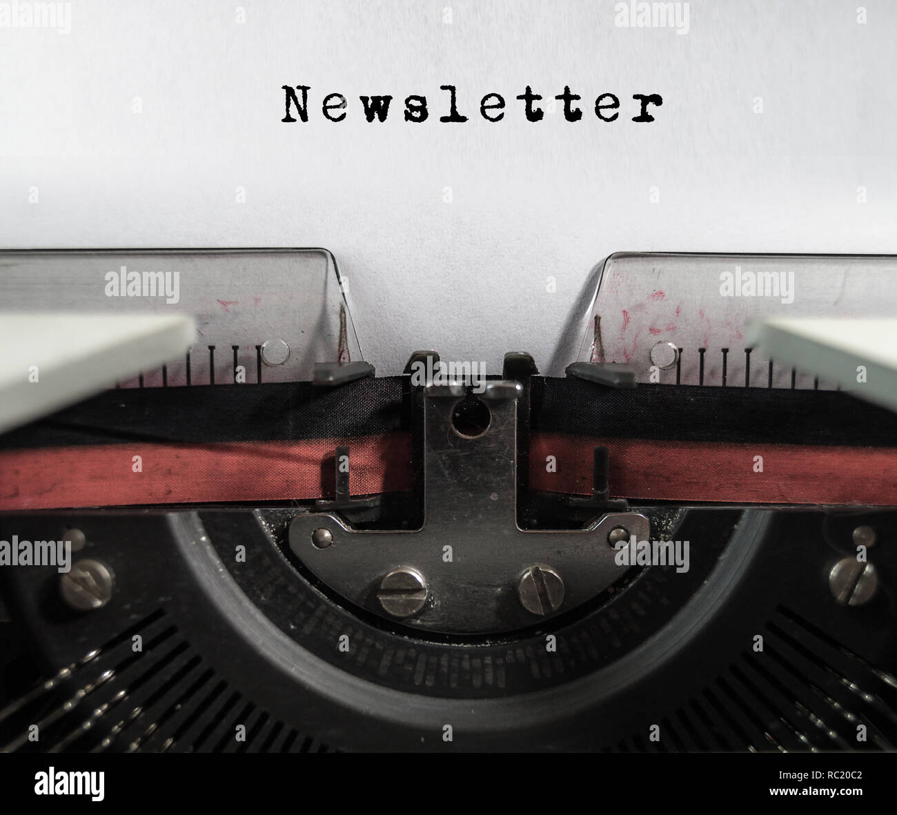 the word newsletter type on old typewriter machine - concept for information Stock Photo