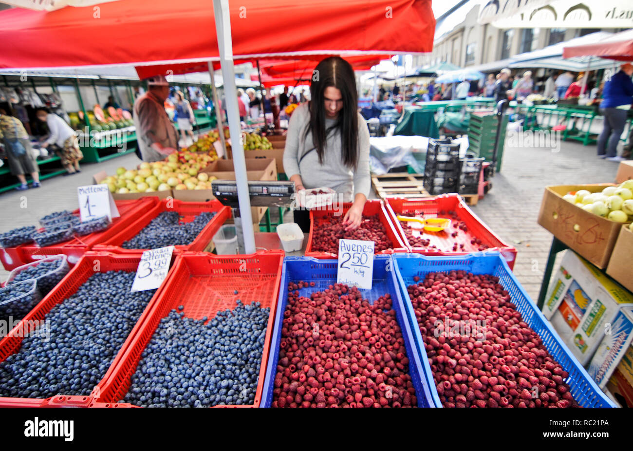 Black berries and red berries. Riga Central Market (Centraltirgus), Latvia Stock Photo