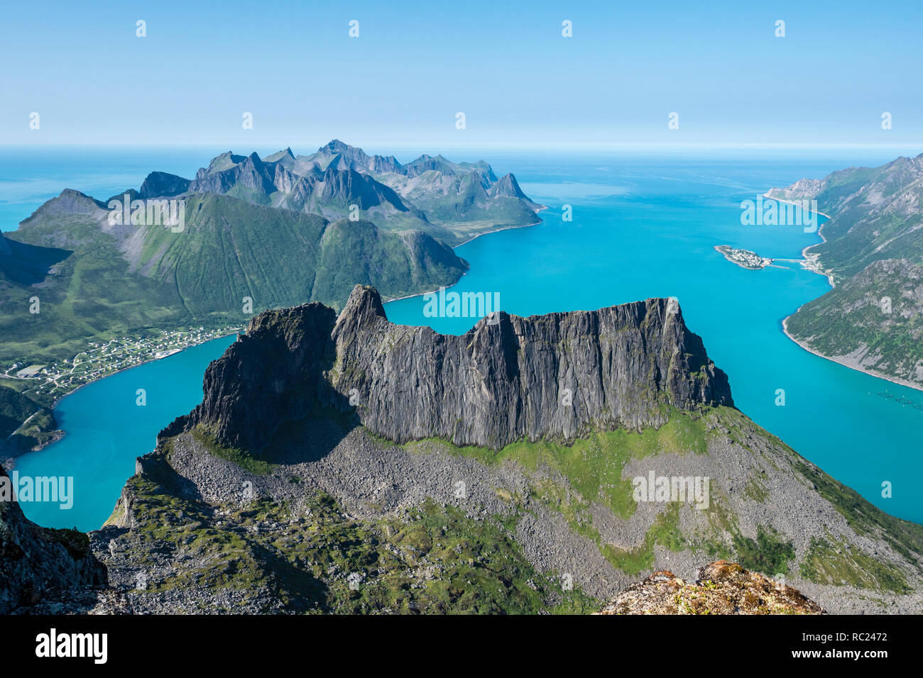 View over fjord Örnfjord, village Fjordgard, seen from mountain Grytetippen, island Senja, Troms, Norway Stock Photo