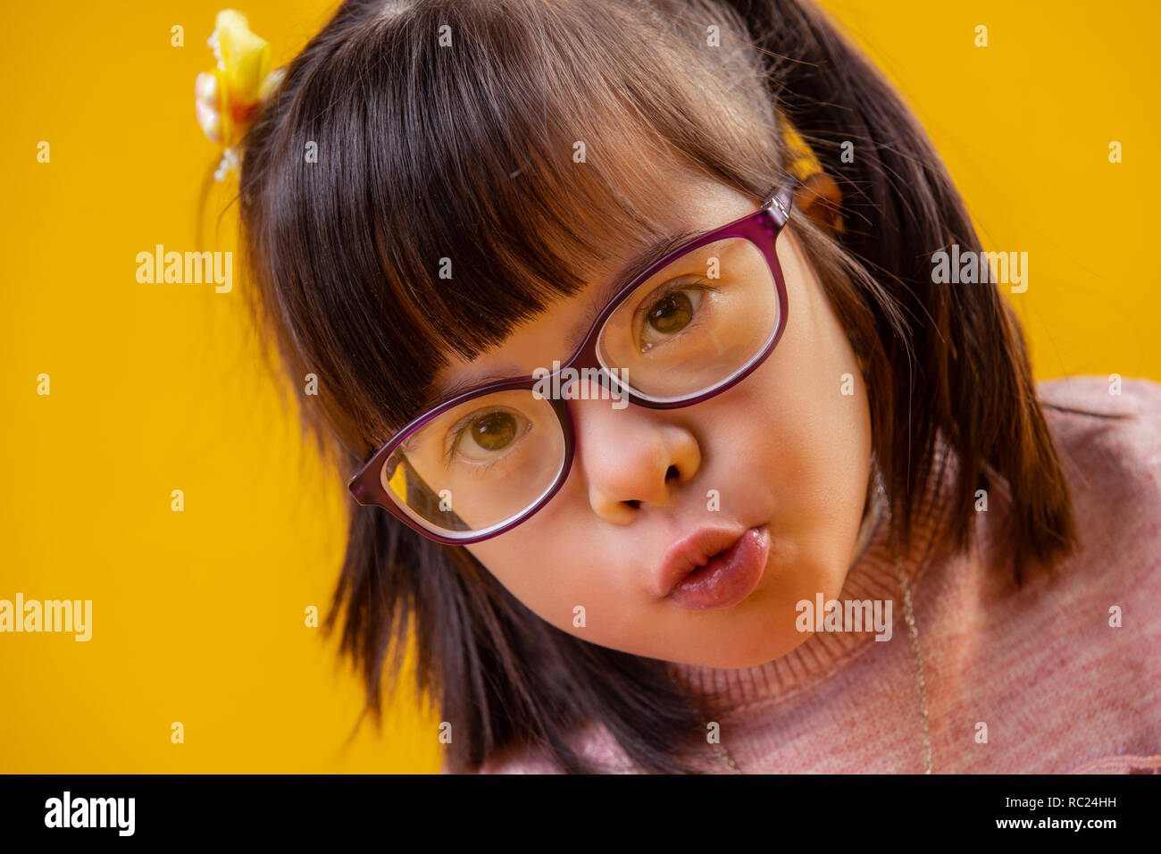 Adorable good-looking little princess with brown eyes Stock Photo