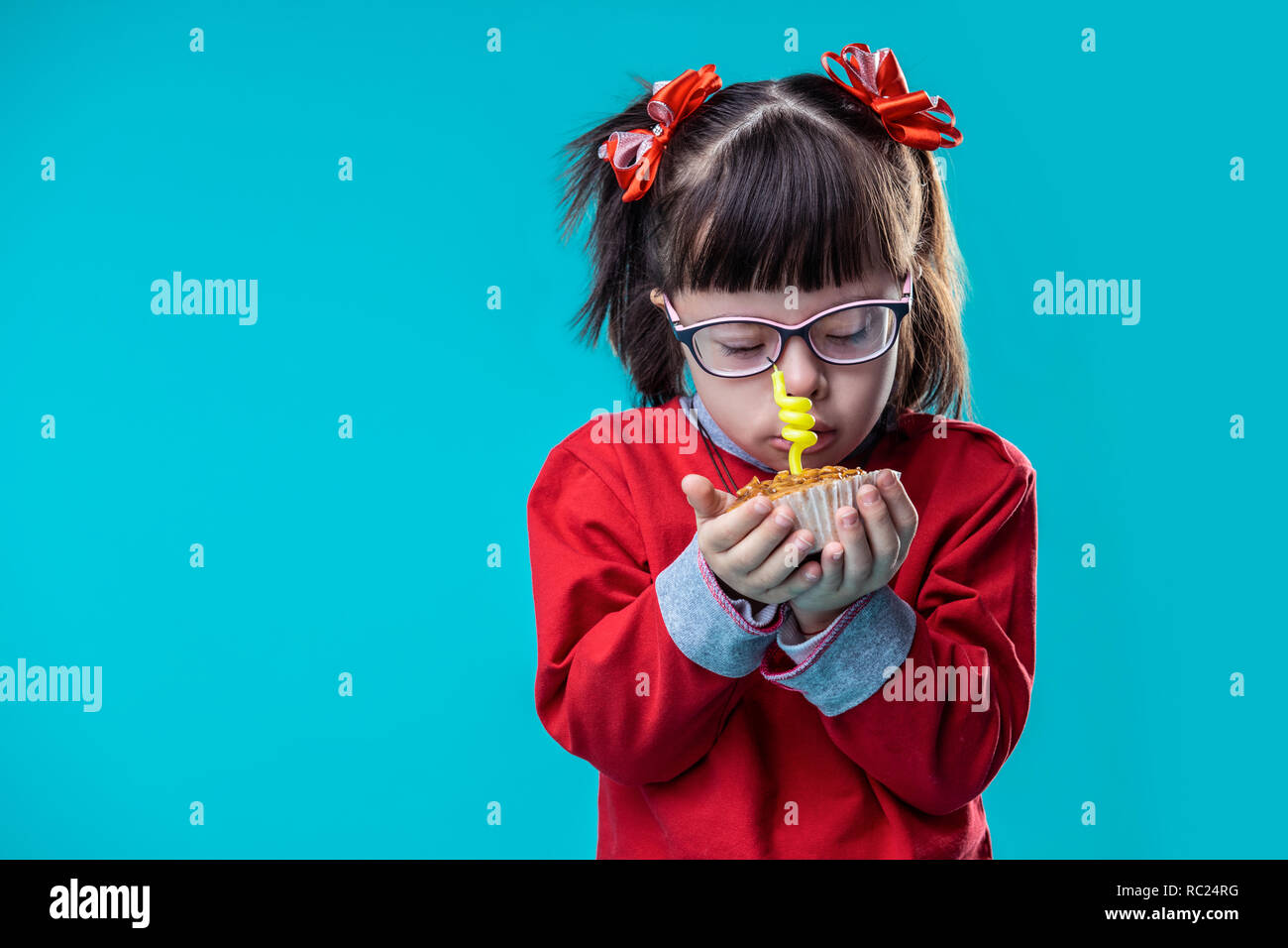 Pretty Little Girl Wearing Red Hoodie And Holding Muffin Stock Photo Alamy