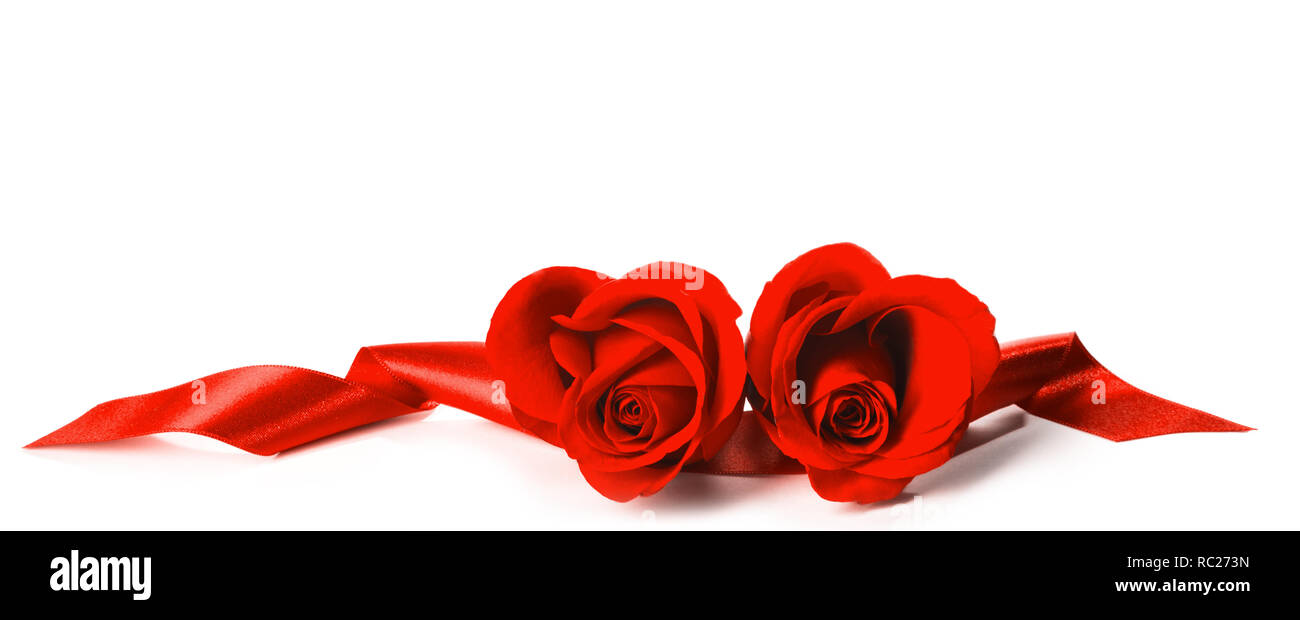 Two Beautiful heart shaped Red Roses with red ribbons isolated on white ...