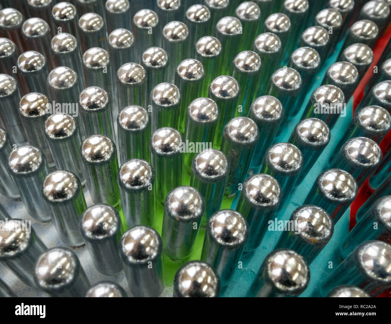 Cream chargers / nitrous oxide cannisters reflecting colourful