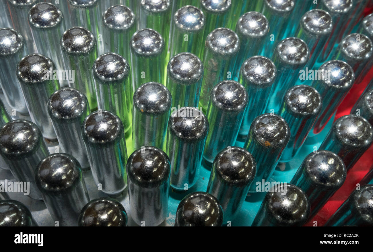 Cream chargers / nitrous oxide cannisters reflecting colourful