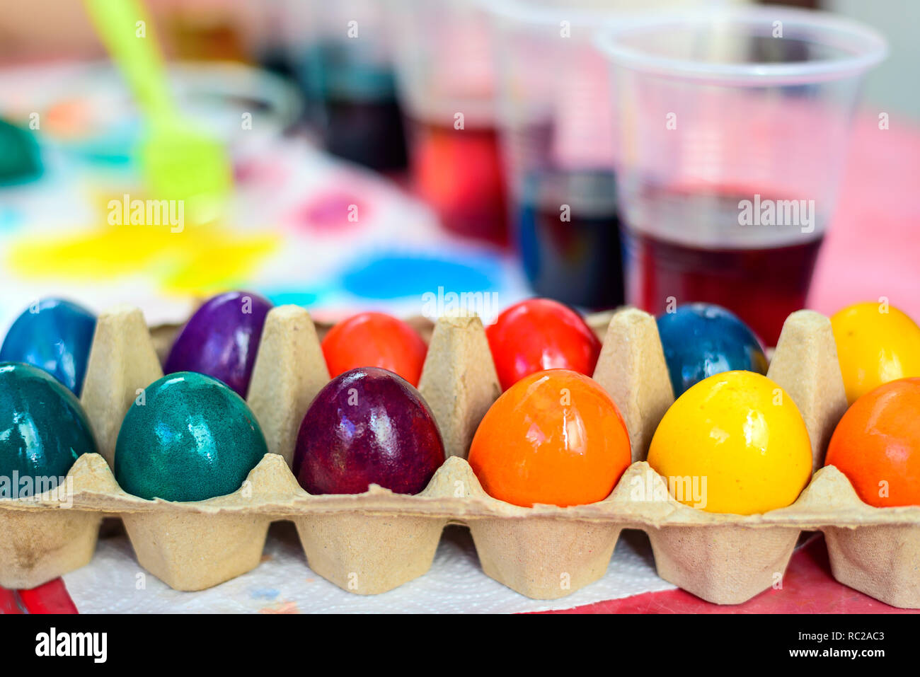 Freshly colored Easter eggs packaged in moulded carton box Stock Photo