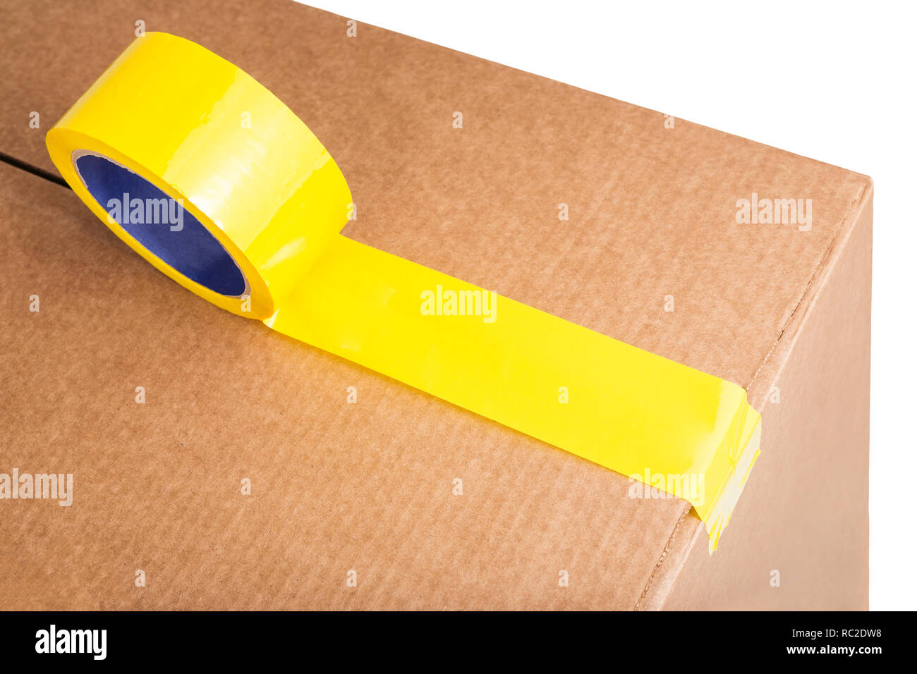 Download Closeup Of Cardboard Box With Yellow Adhesive Tape Stock Photo Alamy PSD Mockup Templates