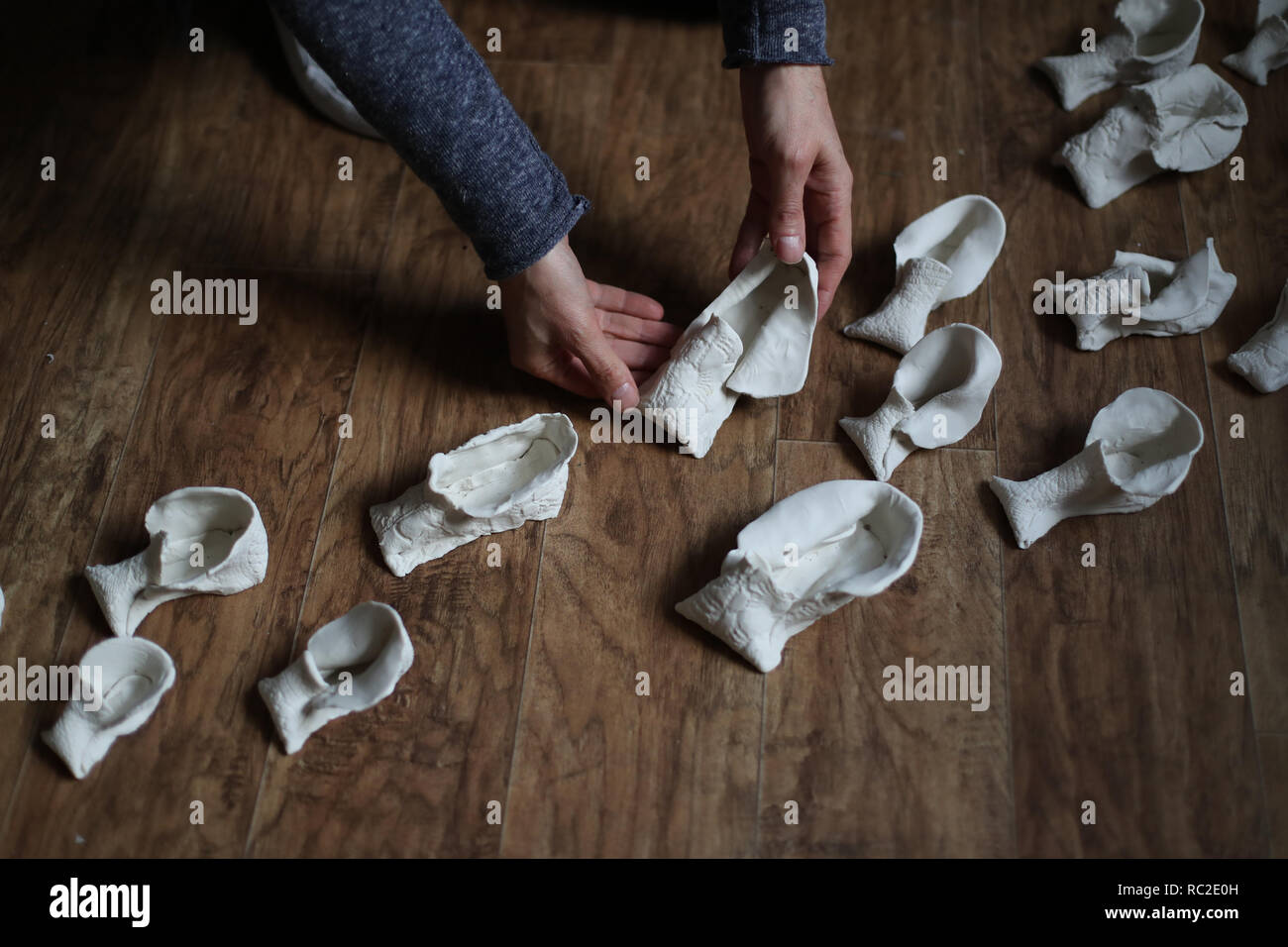 Porcelain Shoes By Artist Holly Malarkey During A Preview Of The