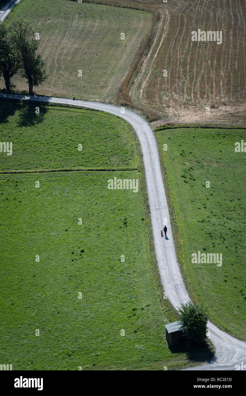 Man walking on winding road hi-res stock photography and images - Alamy