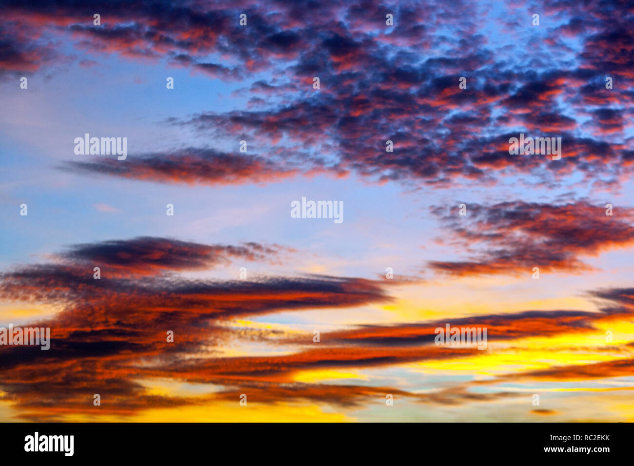 Dramatic sunset sky, red sunset clouds on bloody sky, dramatic clouds, moody sky Stock Photo