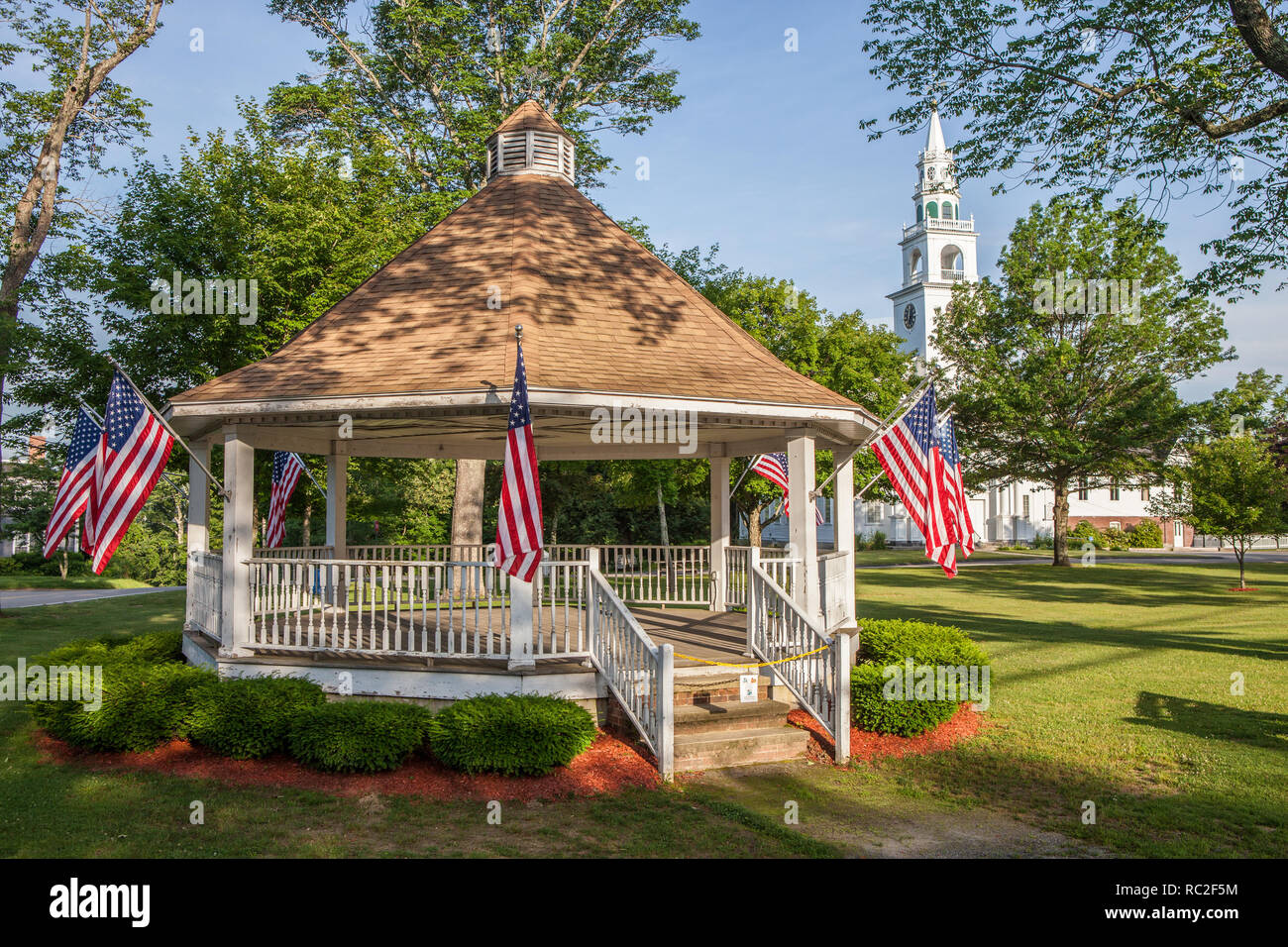Flags flying on the bandstand on Templeton Common, MA Stock Photo