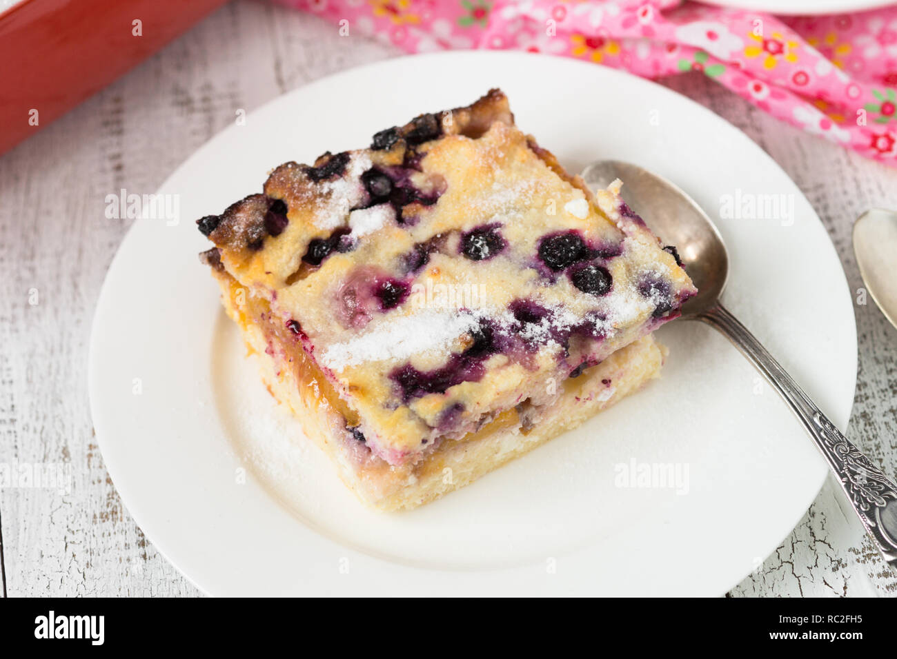 Cottage cheese casserole with peach and blueberry Stock Photo Alamy