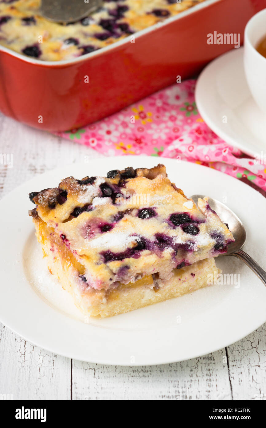 Cottage cheese casserole with peach and blueberry Stock Photo Alamy