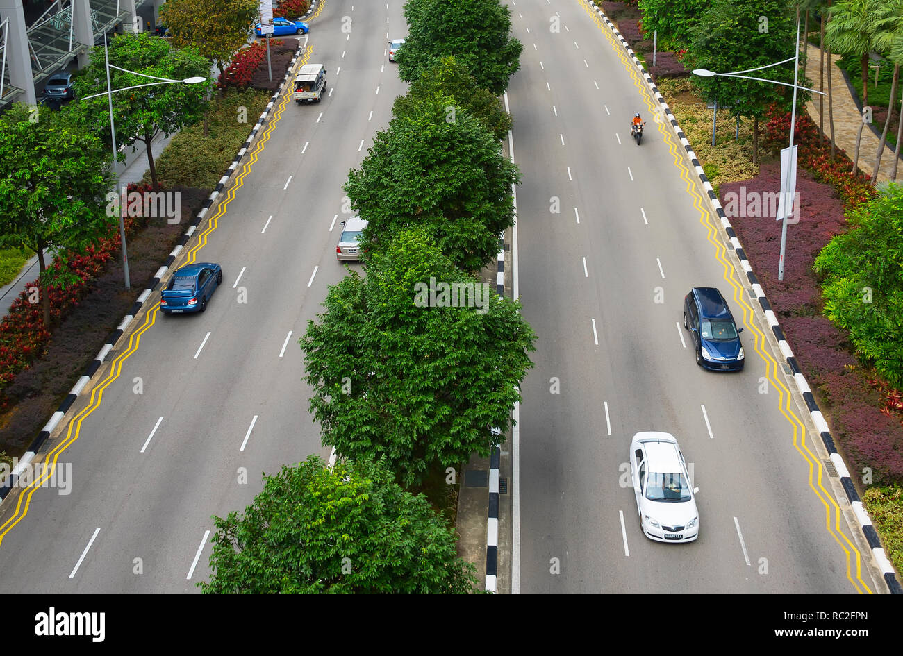 SINGAPORE FEBRUARY 18, 2017 Cars on a road in Singapore Stock Photo