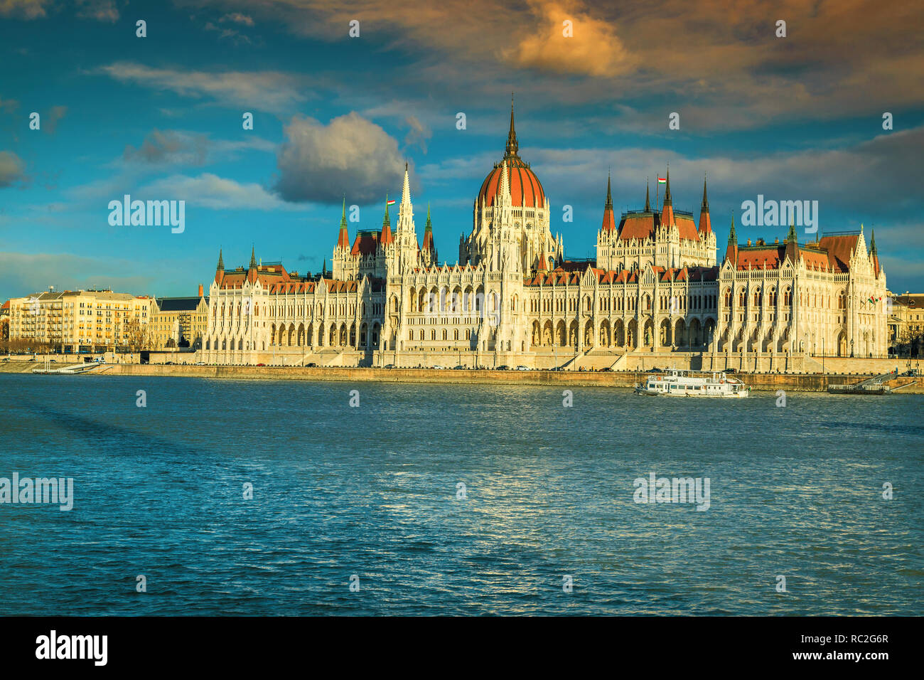 Hungarian parliament building at sunset with Danube river, Budapest, Hungary, Europe Stock Photo