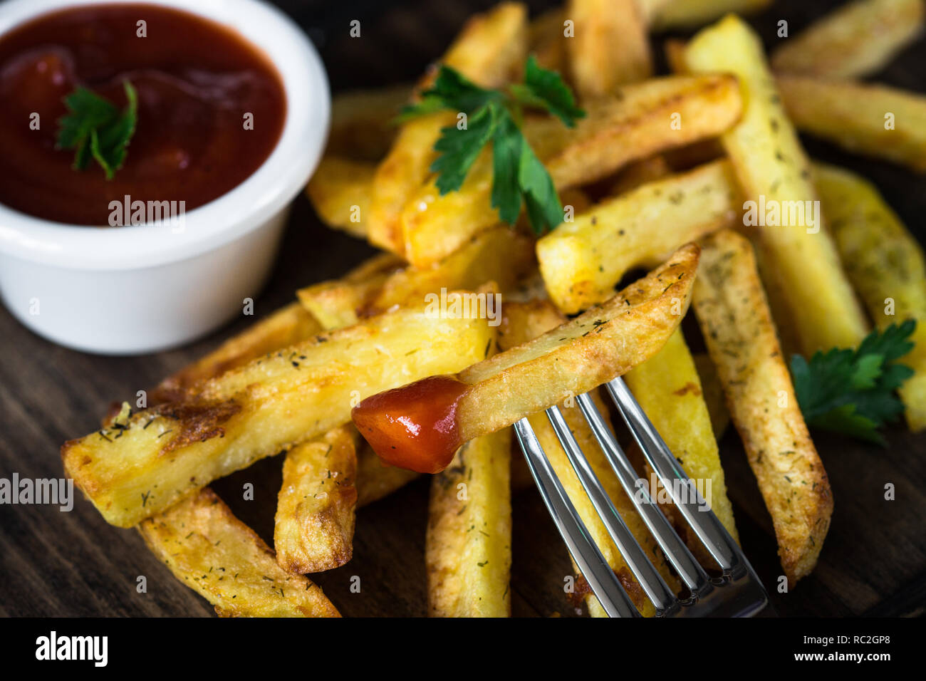 Fried potato with ketchup sauce Stock Photo Alamy