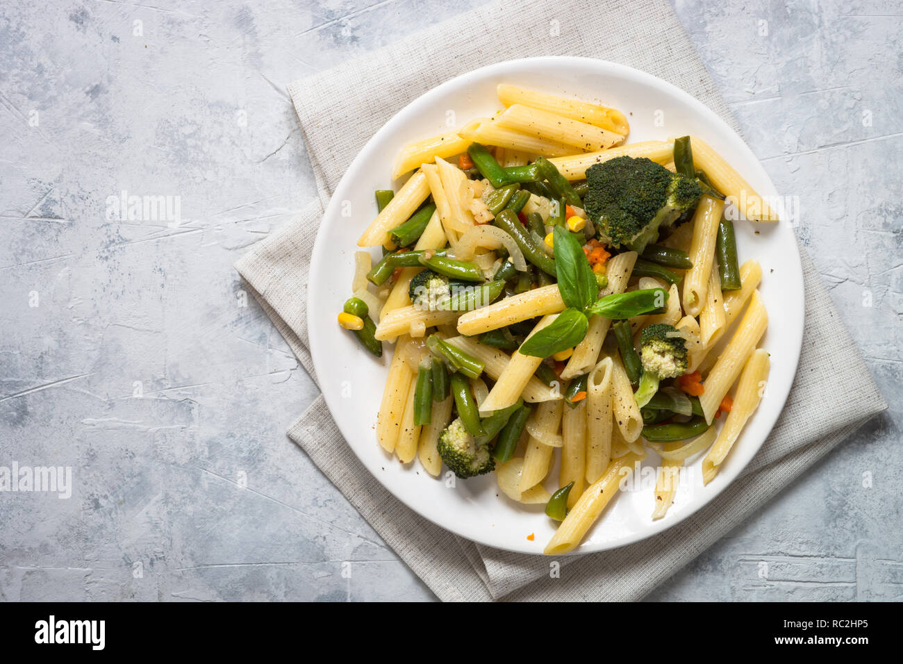 Italian vegetarian pasta penne with green vegetables Stock Photo - Alamy