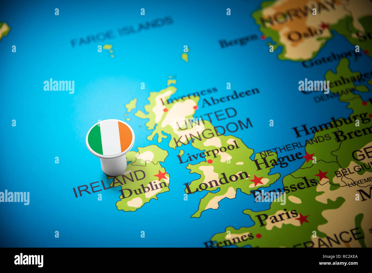 Ireland marked with a flag on the map Stock Photo - Alamy