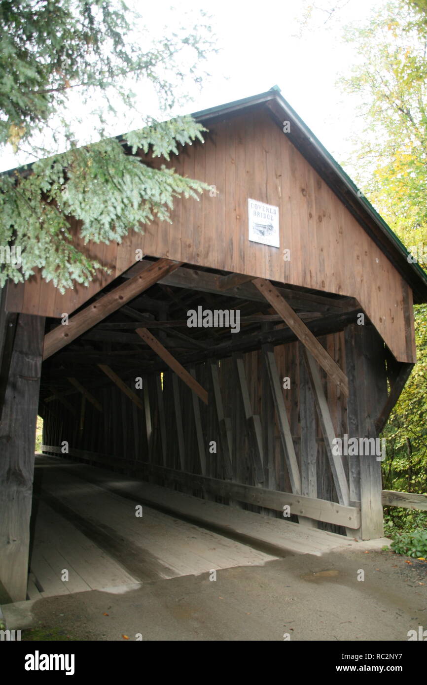 Blow Me Down Covered  Bridge, Cornish, New Hampshire. Showing portal, National Register of Historic Places sign, and internal wooden construction Stock Photo
