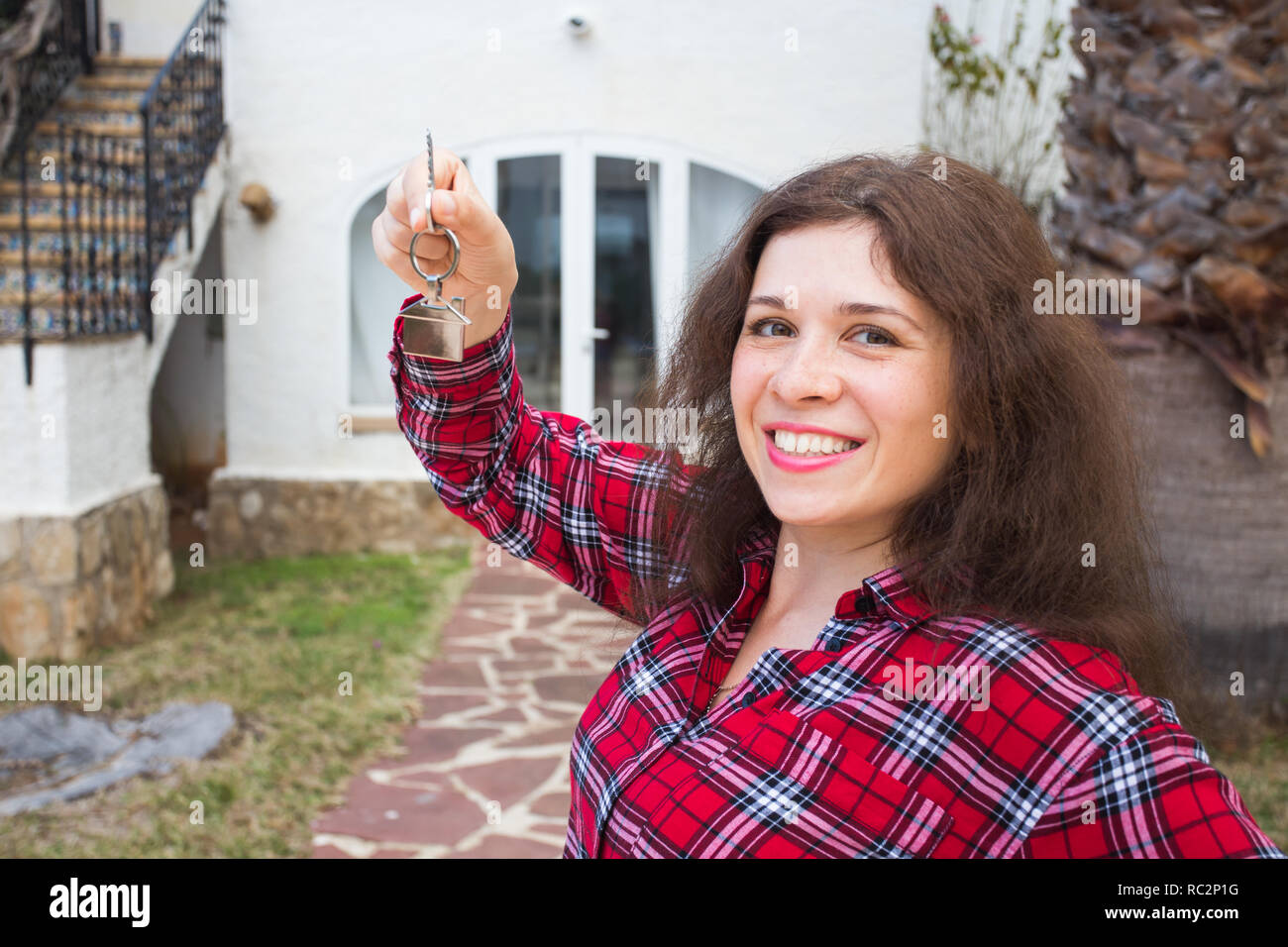 Real estate and property concept. Happy ownership. Attractive young ...