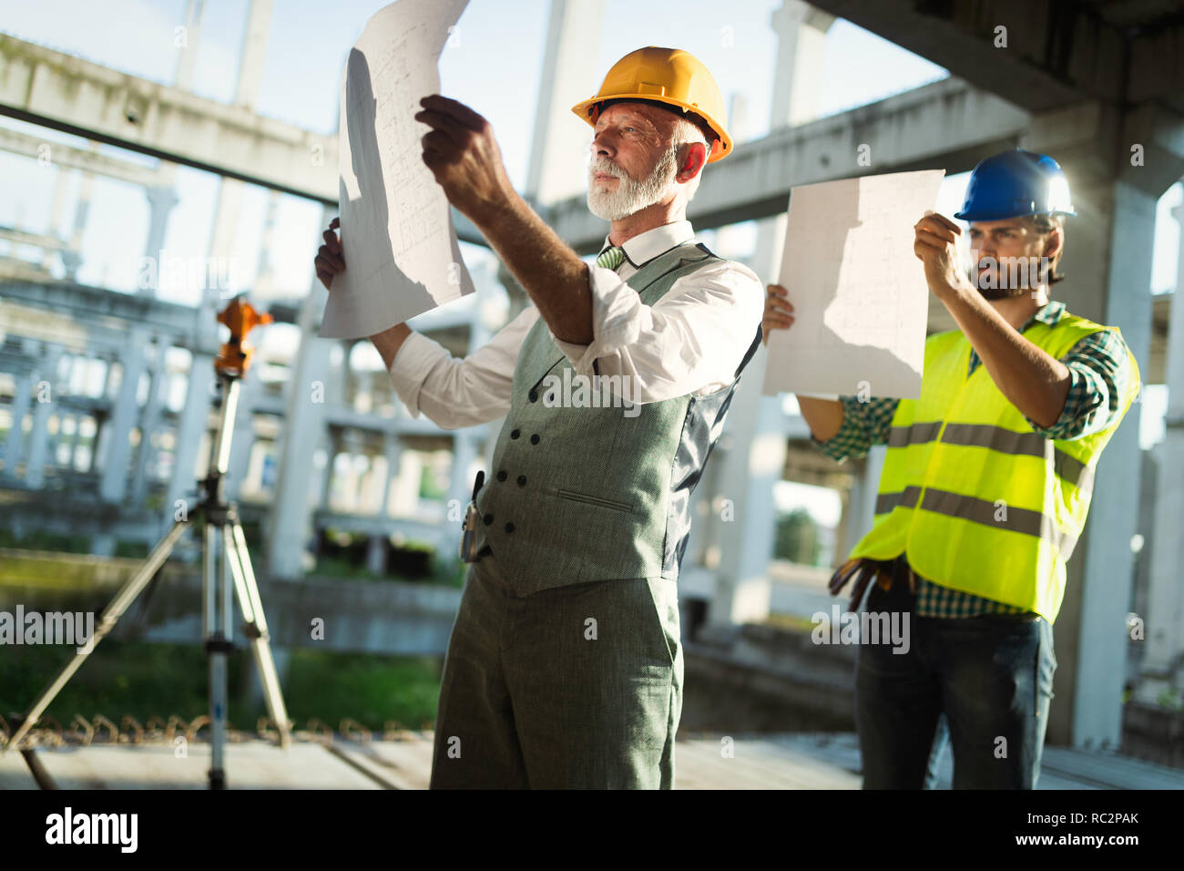 Group of construction engineer working in construction site Stock Photo ...