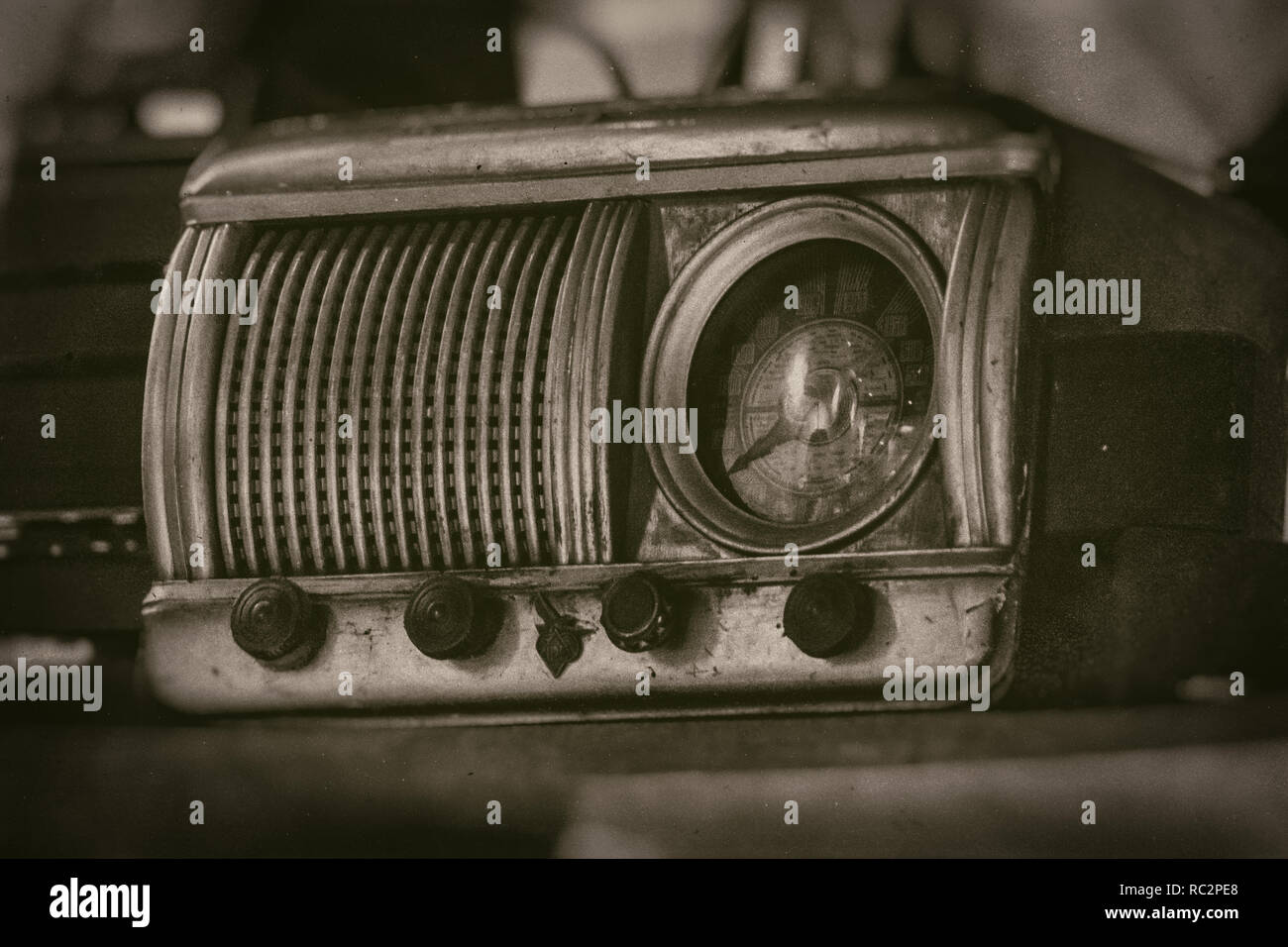 Old vintage radio receiver of the last century with rustic clock build