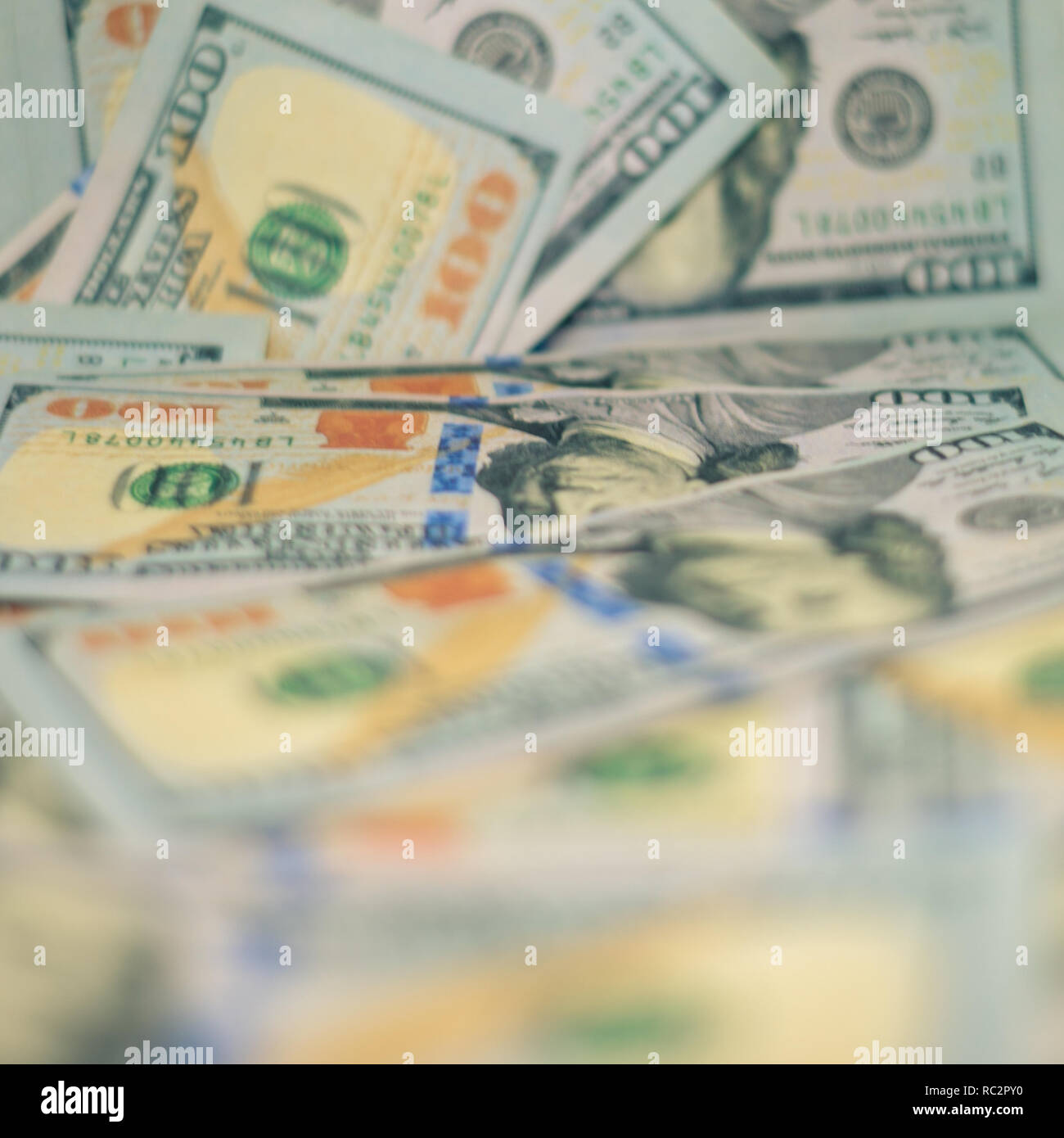 Finance concept, savings in 100 dollar bills Stock Photo