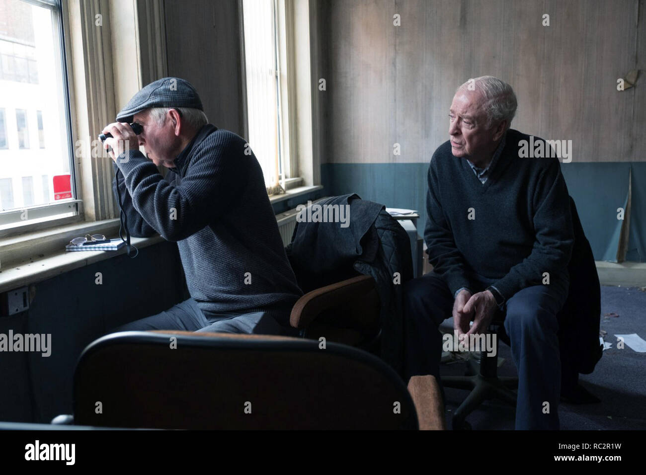 King of Thieves, is a 2018 British crime film based on the Hatton Garden safe deposit burglary of 2015. Directed by James Marsh, the film stars Michael Caine, Tom Courtenay, Michael Gambon, Charlie Cox, Jim Broadbent, Paul Whitehouse and Ray Winstone.    This photograph is for editorial use only and is the copyright of the film company and/or the photographer assigned by the film or production company and can only be reproduced by publications in conjunction with the promotion of the above Film. A Mandatory Credit to the film company is required. The Photographer should also be credited when k Stock Photo