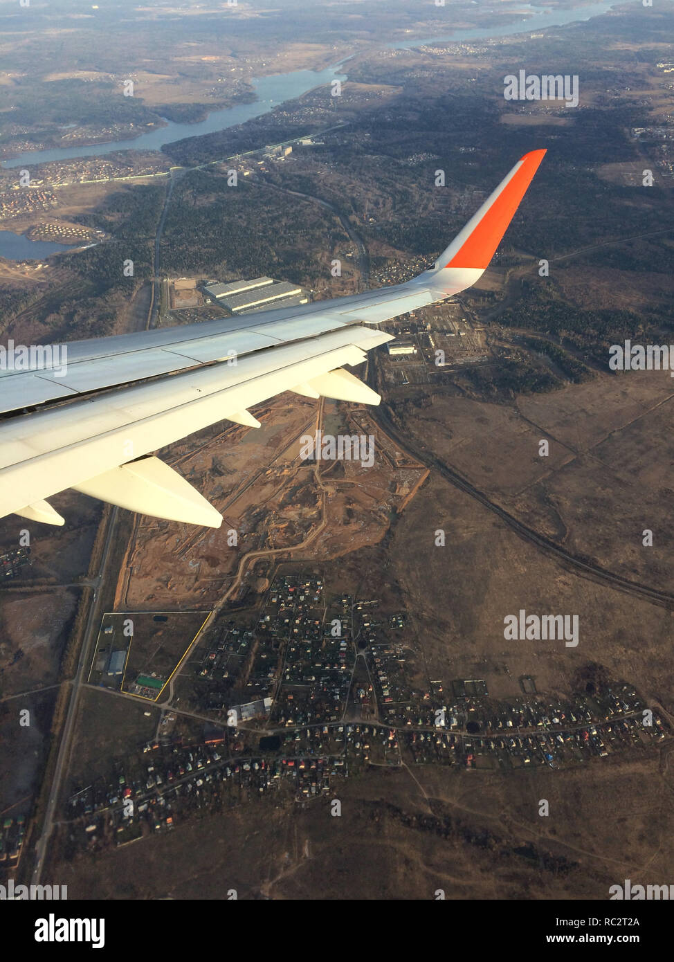 Village of Beliy Rast next to Iksha urban locality near Moscow, Russia. Aerial view pictured from the Airbus A321 aircraft. Stock Photo