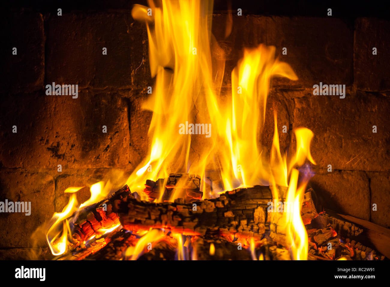Wood Burning In A Cozy Fireplace At Home Keep Warm Stock Photo