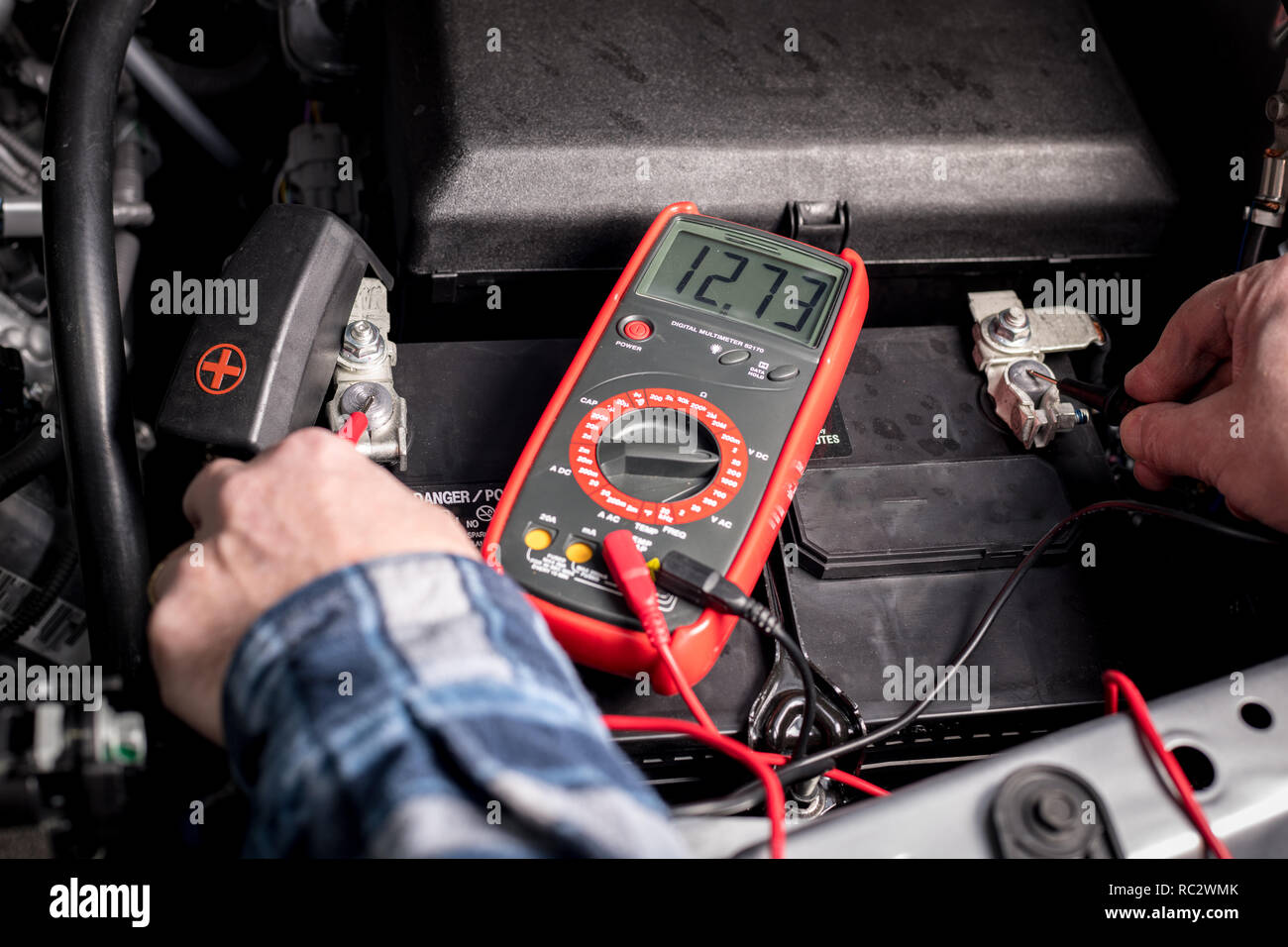 Volt meter used to test a batteries voltage Stock Photo Alamy