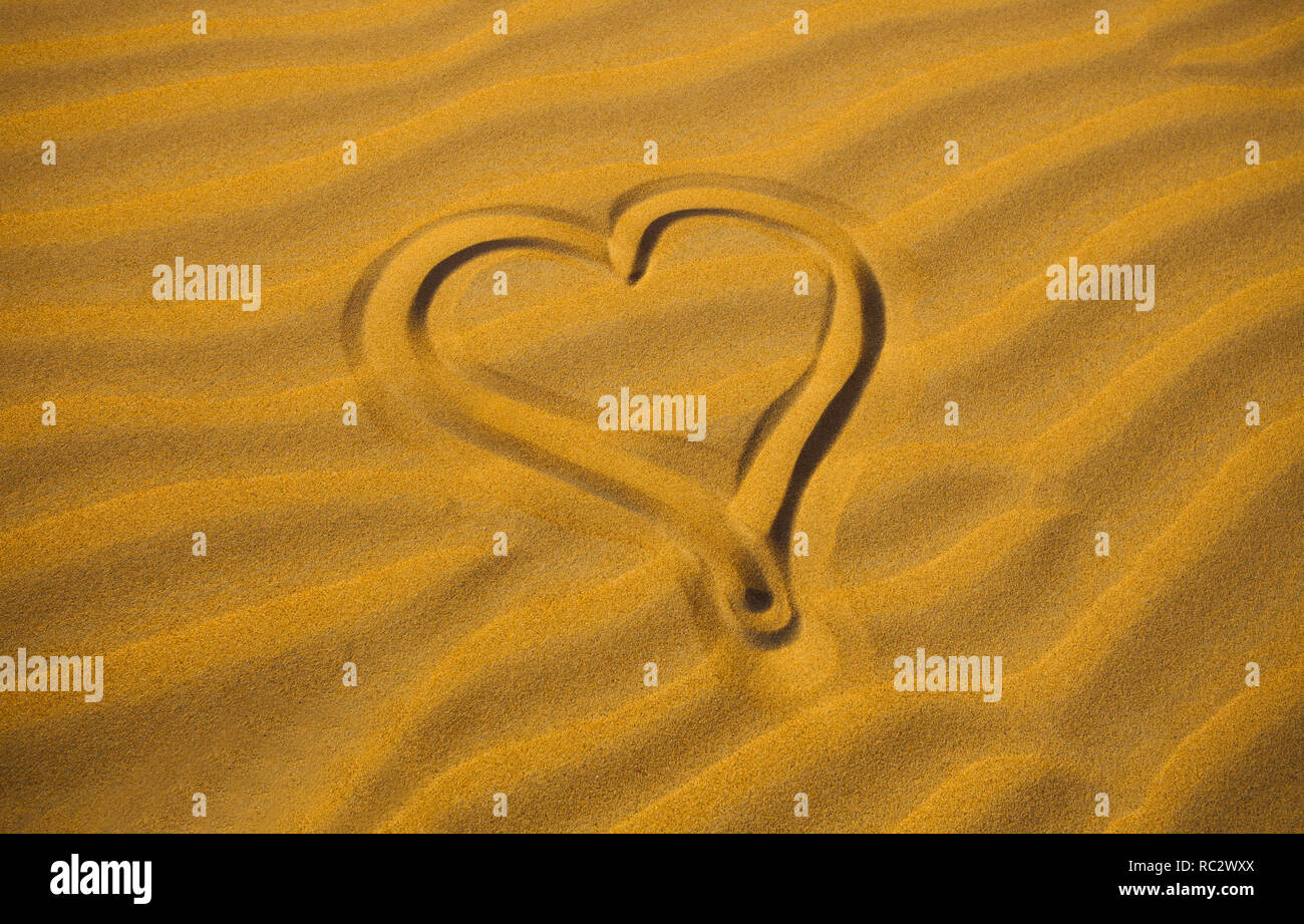 drawing of romantic heart in the arabic sand desert. love concept Stock  Photo - Alamy, image size:1300x921