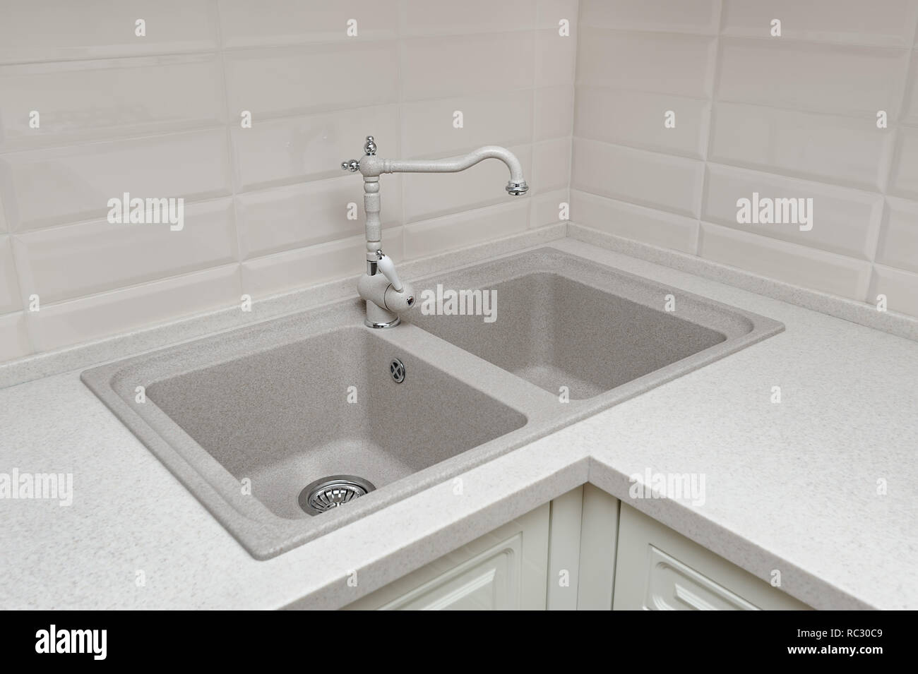 Tap water and sink at kitchen Stock Photo - Alamy