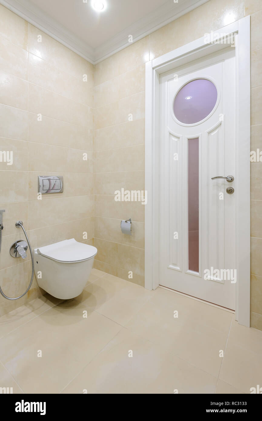 Bright bathroom interior with toilet Stock Photo