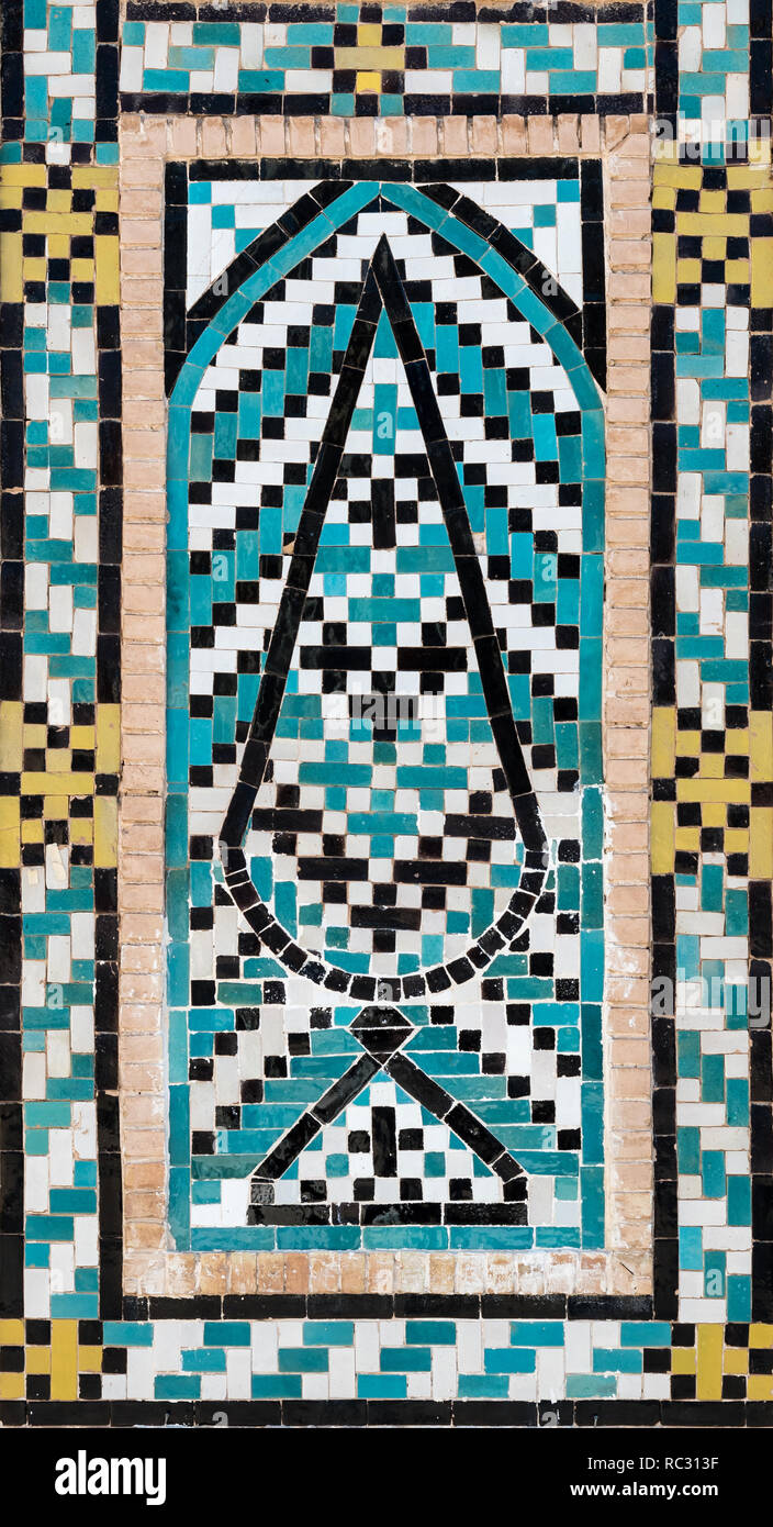 Beautiful decorative turqouise blue tiled mosaic with tree motif, Shah Nematollah Vali Shrine, Iran Stock Photo